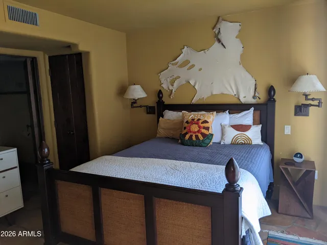 a hallway with two black and white walls