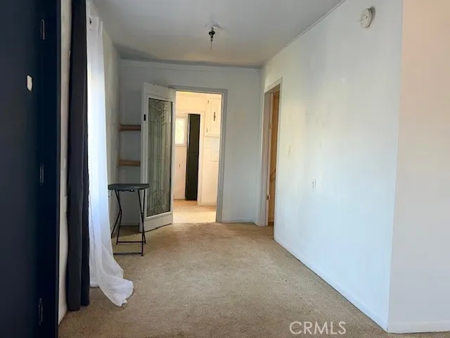 a view of entryway with bathroom