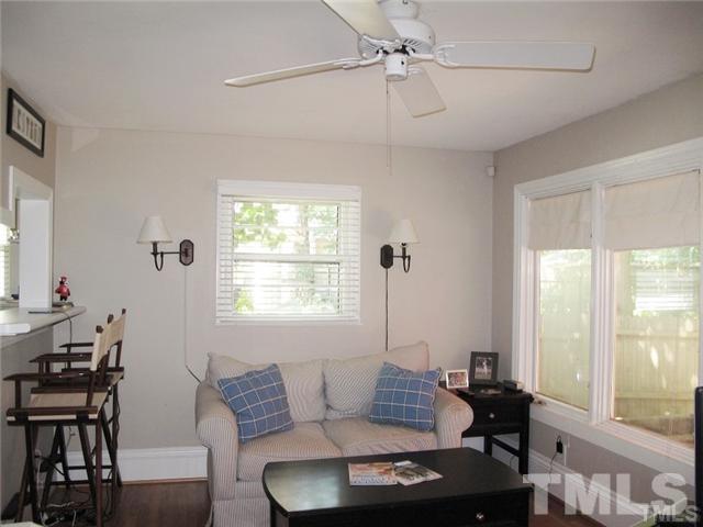 2221 The Circle Raleigh, NC 27608 - Photo 8 of 15 a living room with furniture and a window