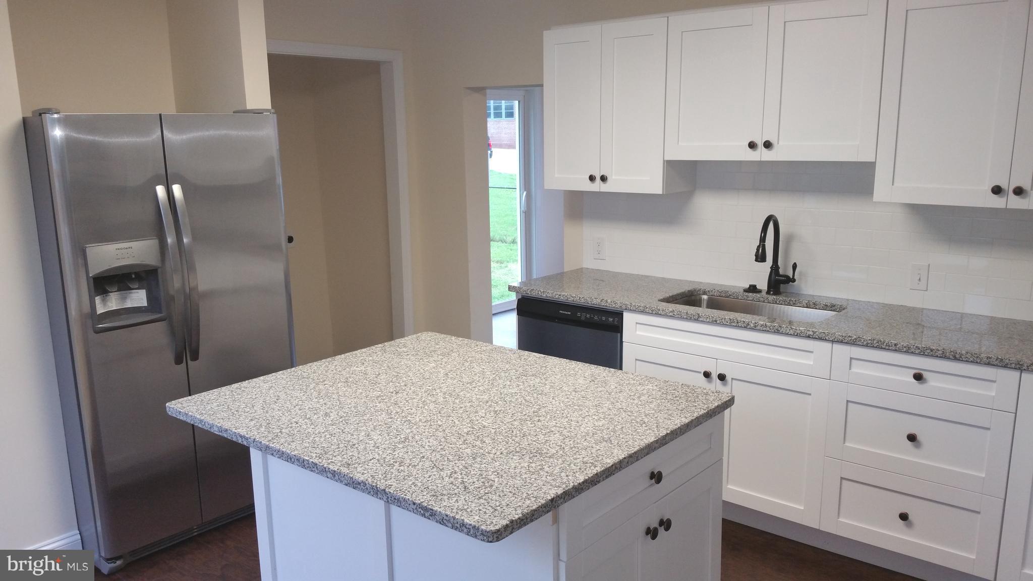 1256 Sulphur Spring Road Baltimore, MD 21227 - Photo 3 of 18 Huge side by side stainless steel fridge!