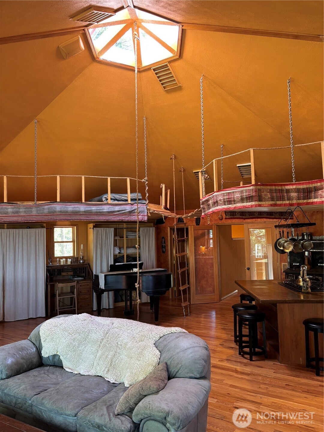 0 Big Springs Ranch Road Wenatchee, WA 98801 - Photo 5 of 26 a living room with furniture a flat screen tv and kitchen view