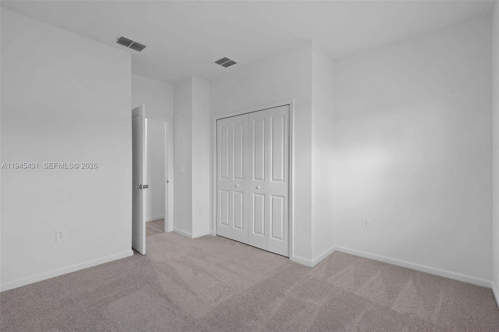 8934 Southwest 69th Terrace Ocala, FL 34476 - Photo 11 of 41 a view of an empty room