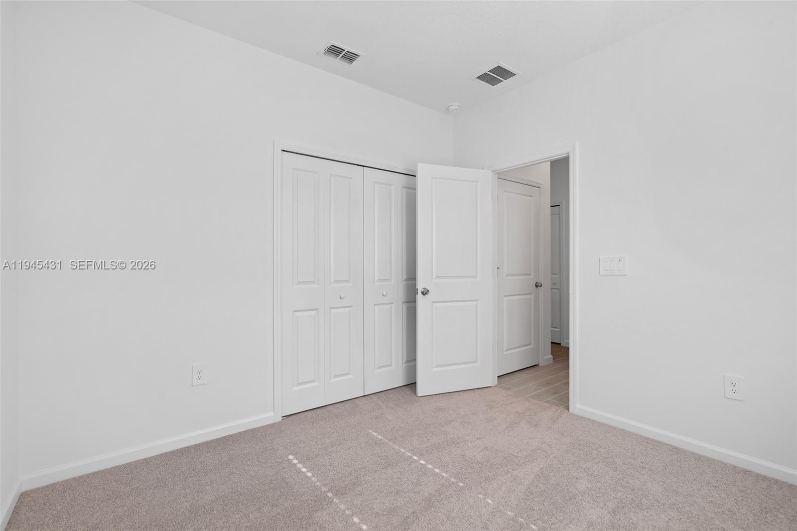 8934 Southwest 69th Terrace Ocala, FL 34476 - Photo 14 of 41 a view of an empty room