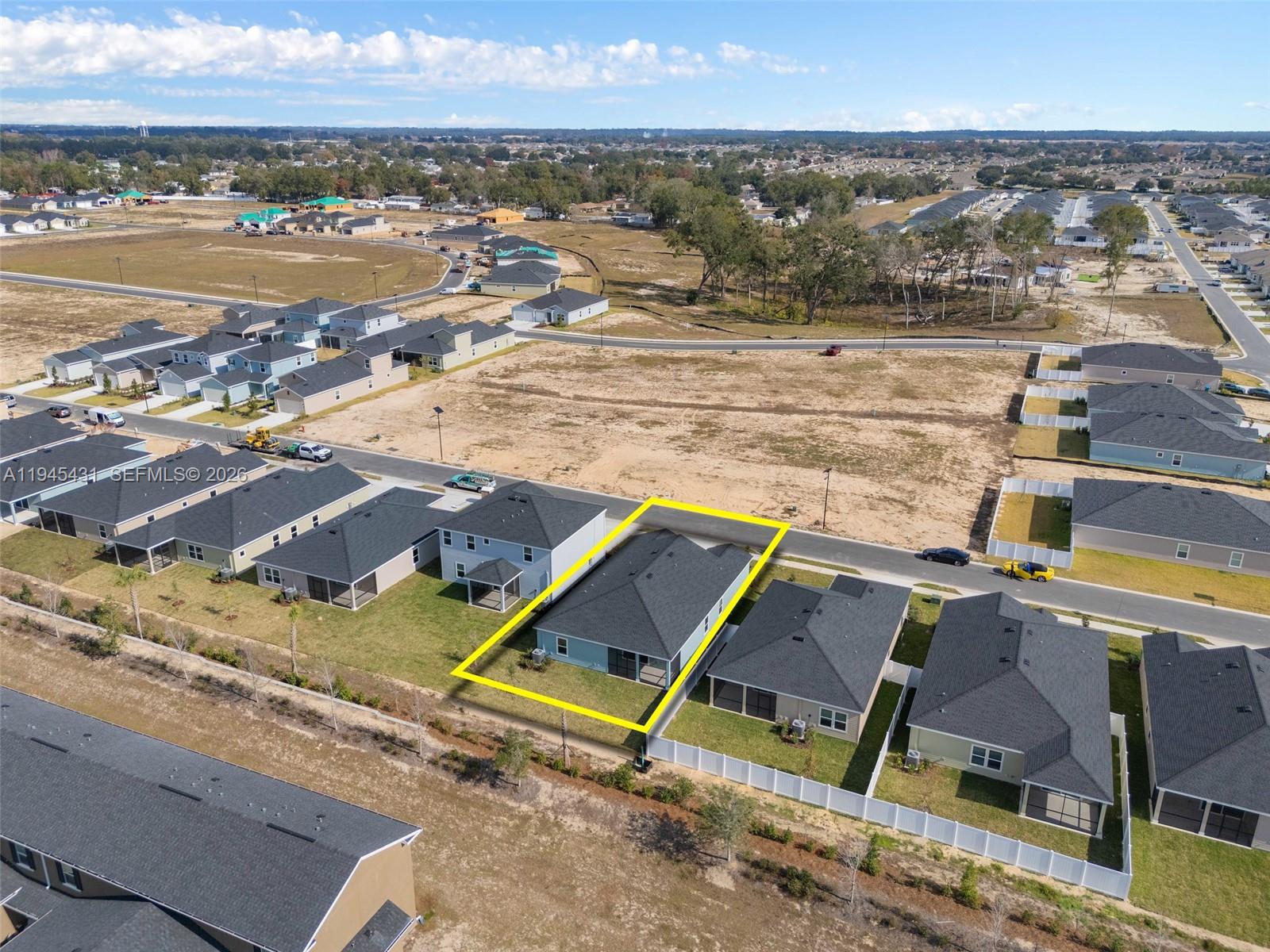 8934 Southwest 69th Terrace Ocala, FL 34476 - Photo 40 of 41 an aerial view of residential houses with outdoor space