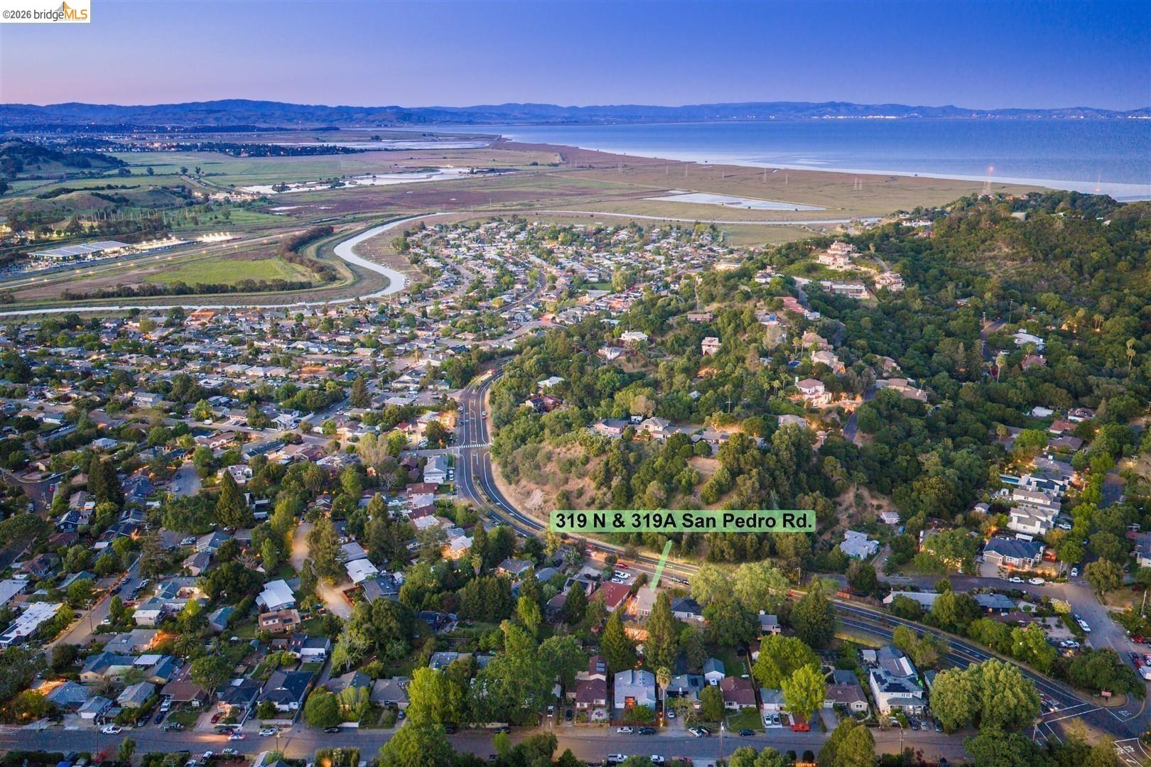 319 North San Pedro Road San Rafael, CA 94903 - Photo 46 of 60 aerial view of property's location featuring nearby suburban area and a water and mountain view