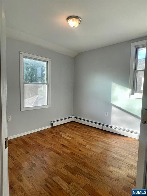 82-84 Maple Avenue, Unit 2 Wallington, NJ 07057 - Photo 8 of 11 a view of an empty room with a window