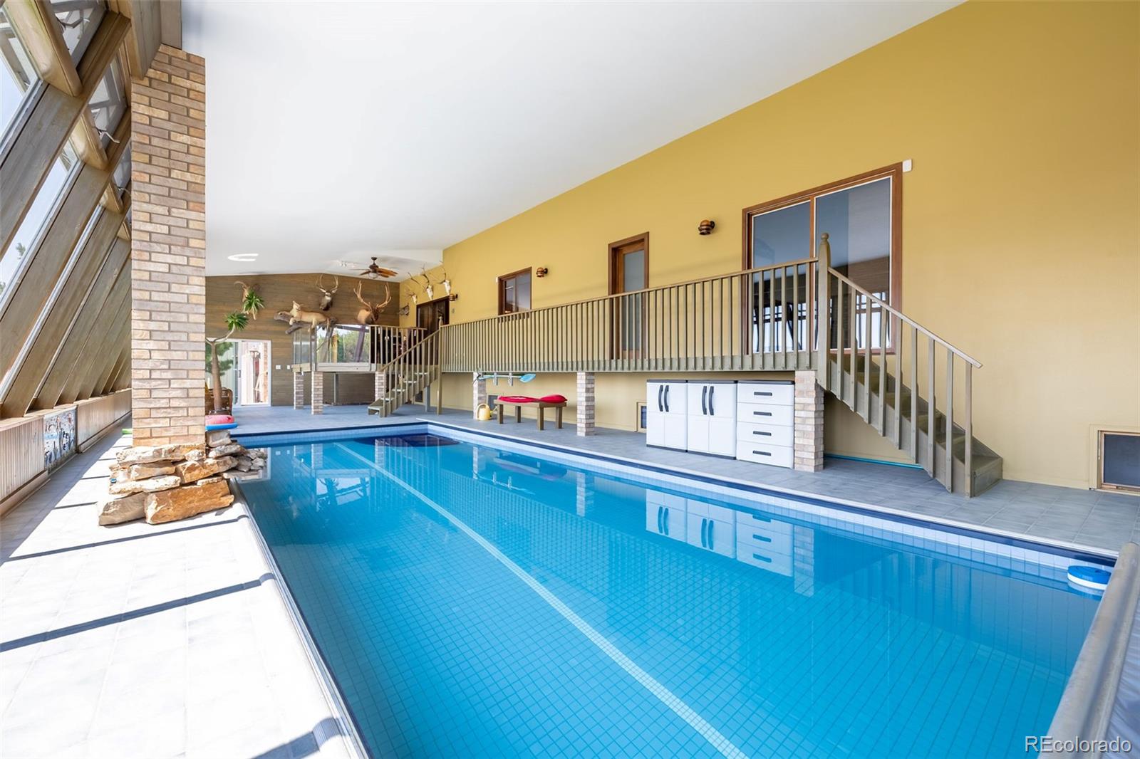 16609 West 77th Drive Arvada, CO 80007 - Photo 35 of 48 a view of a kitchen with a large window