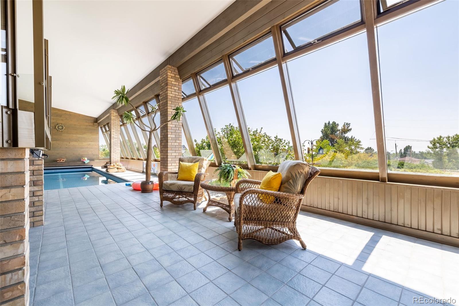 16609 West 77th Drive Arvada, CO 80007 - Photo 37 of 48 a building outdoor space with seating