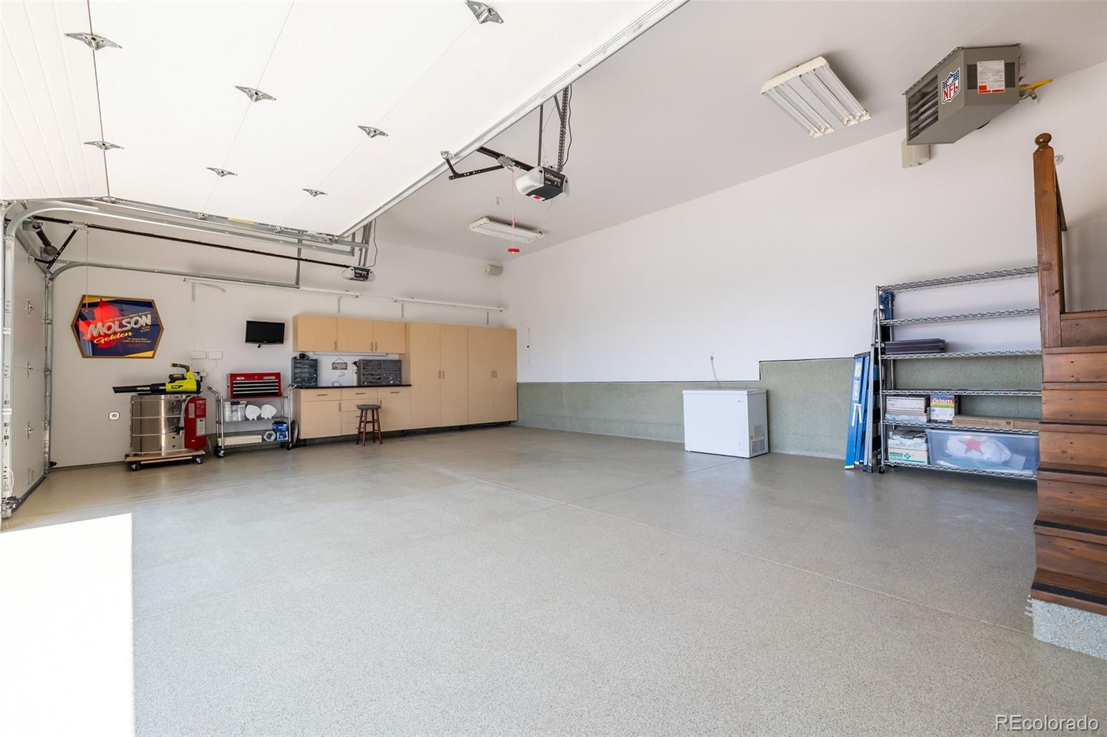 16609 West 77th Drive Arvada, CO 80007 - Photo 38 of 48 a view of a storage & utility room with two washing machine