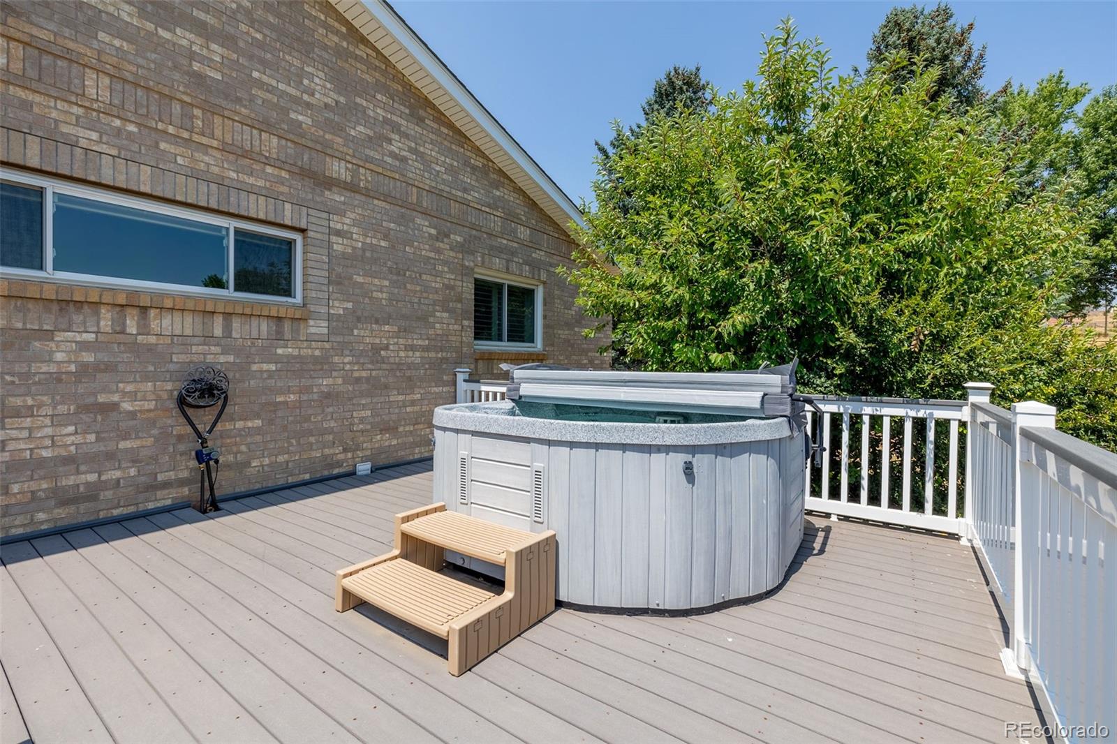 16609 West 77th Drive Arvada, CO 80007 - Photo 44 of 48 a wooden floor on top of a wooden deck