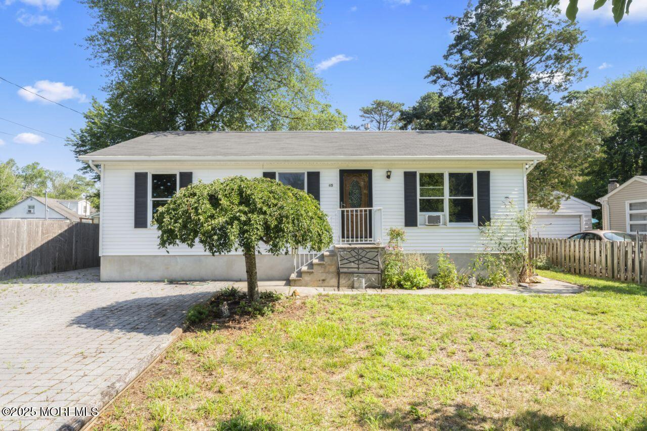 45 Letts Landing Road Waretown, NJ 08758 - Photo 3 of 28 a house view with a garden space