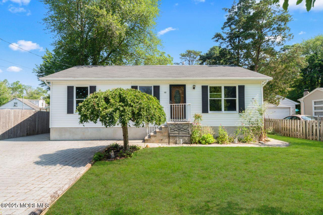 45 Letts Landing Road Waretown, NJ 08758 - Photo 4 of 28 a house with garden in front of it