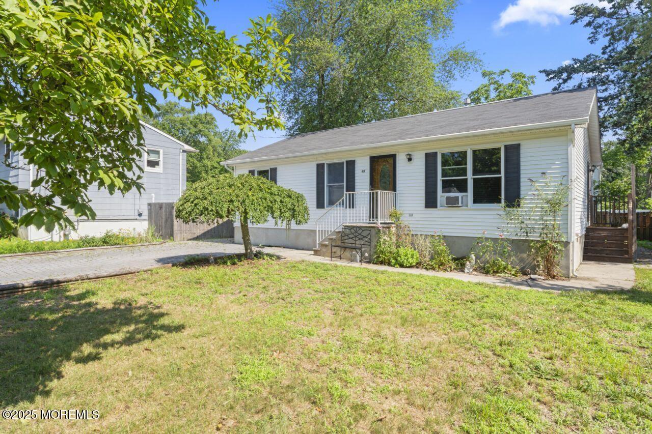 45 Letts Landing Road Waretown, NJ 08758 - Photo 6 of 28 front view of a house with a yard