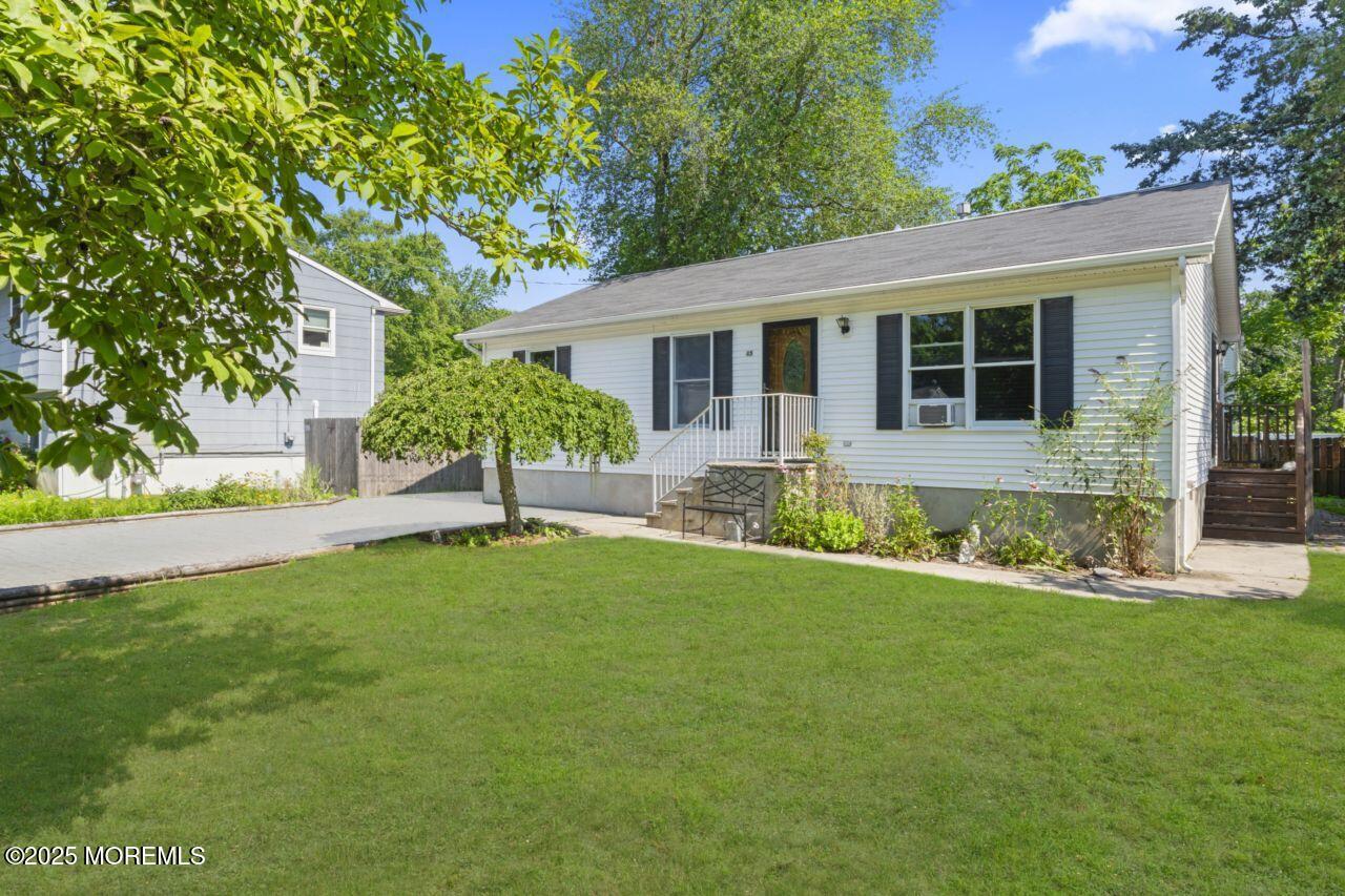 45 Letts Landing Road Waretown, NJ 08758 - Photo 7 of 28 front view of a house with a yard