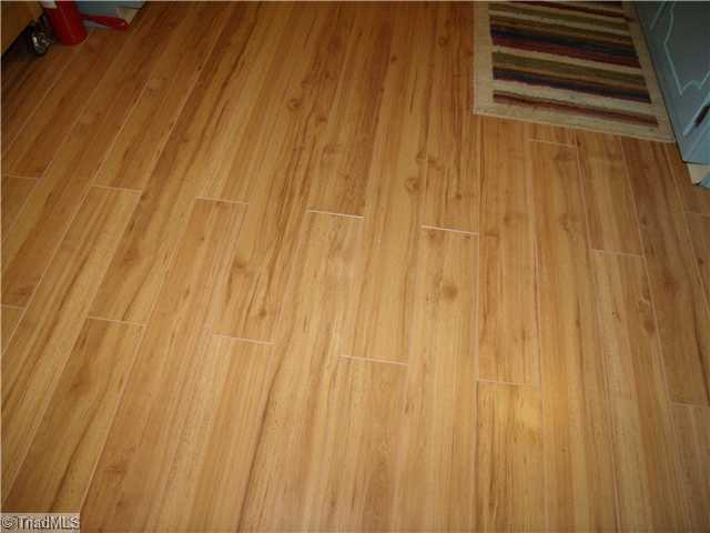 105 Ridgecrest Drive King, NC 27021 - Photo 11 of 15 Other. Beautiful laminate flooring in kitchen & dining area.