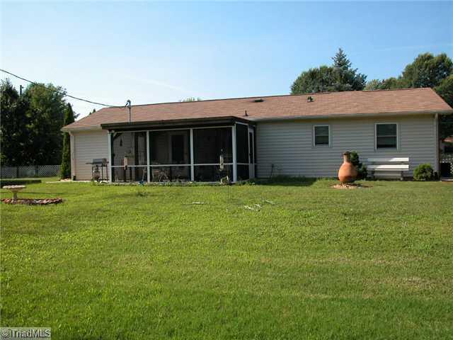 Exterior Back. Great fenced & level backyard.