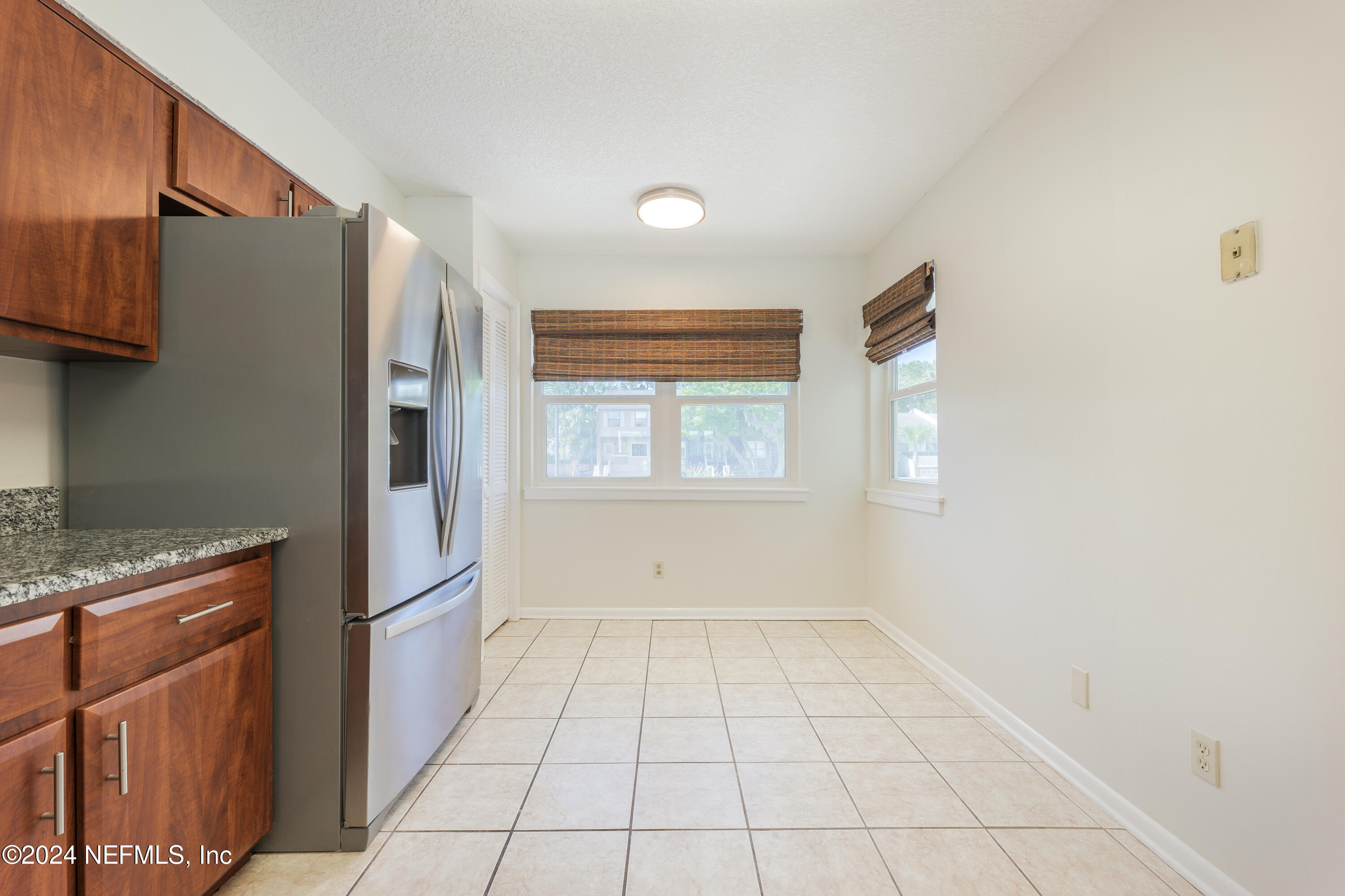 327 Scenic Point Lane Fleming Island, FL 32003 - Photo 13 of 54 a kitchen with a refrigerator a oven and cabinets