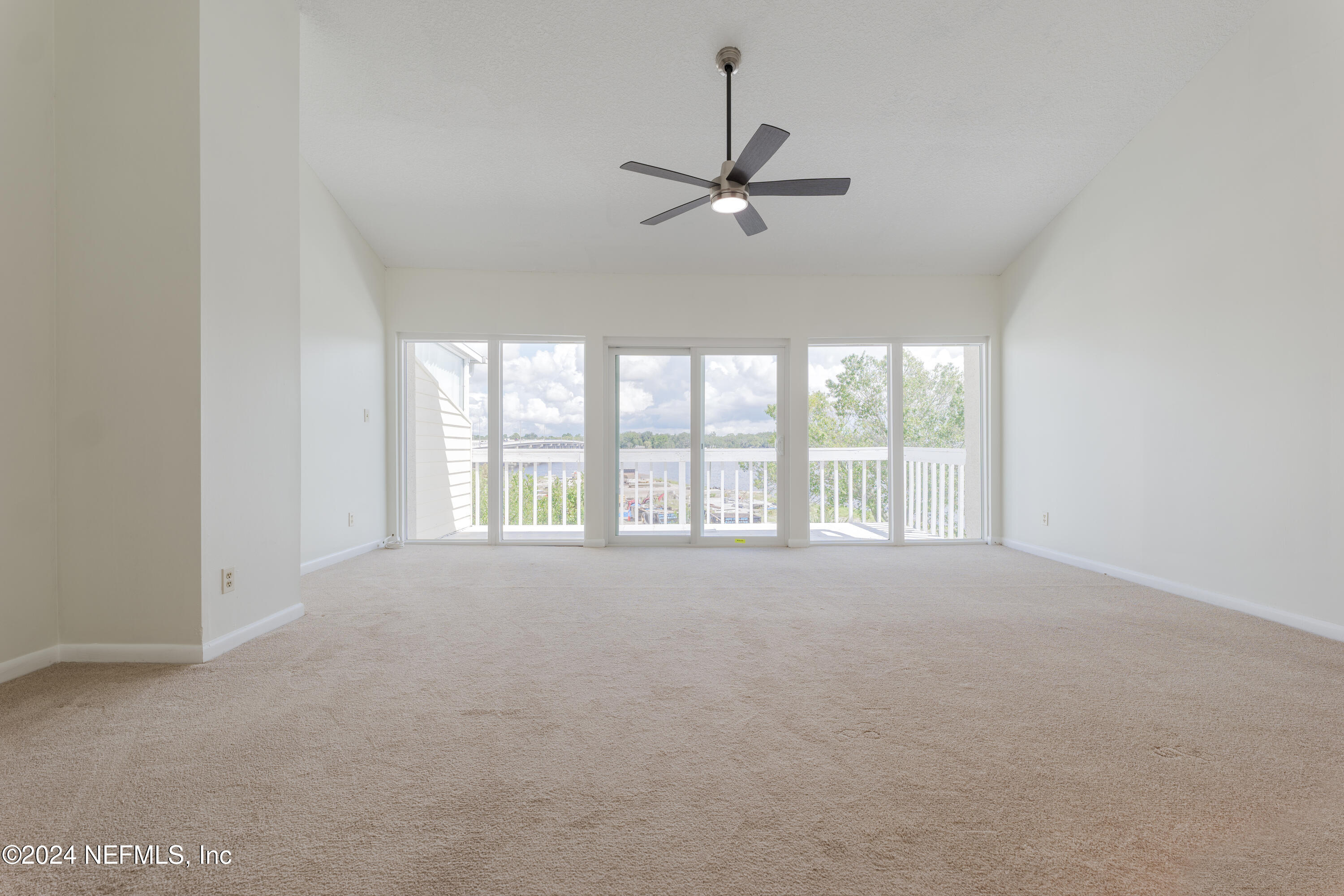 327 Scenic Point Lane Fleming Island, FL 32003 - Photo 24 of 54 a view of an empty room with a window