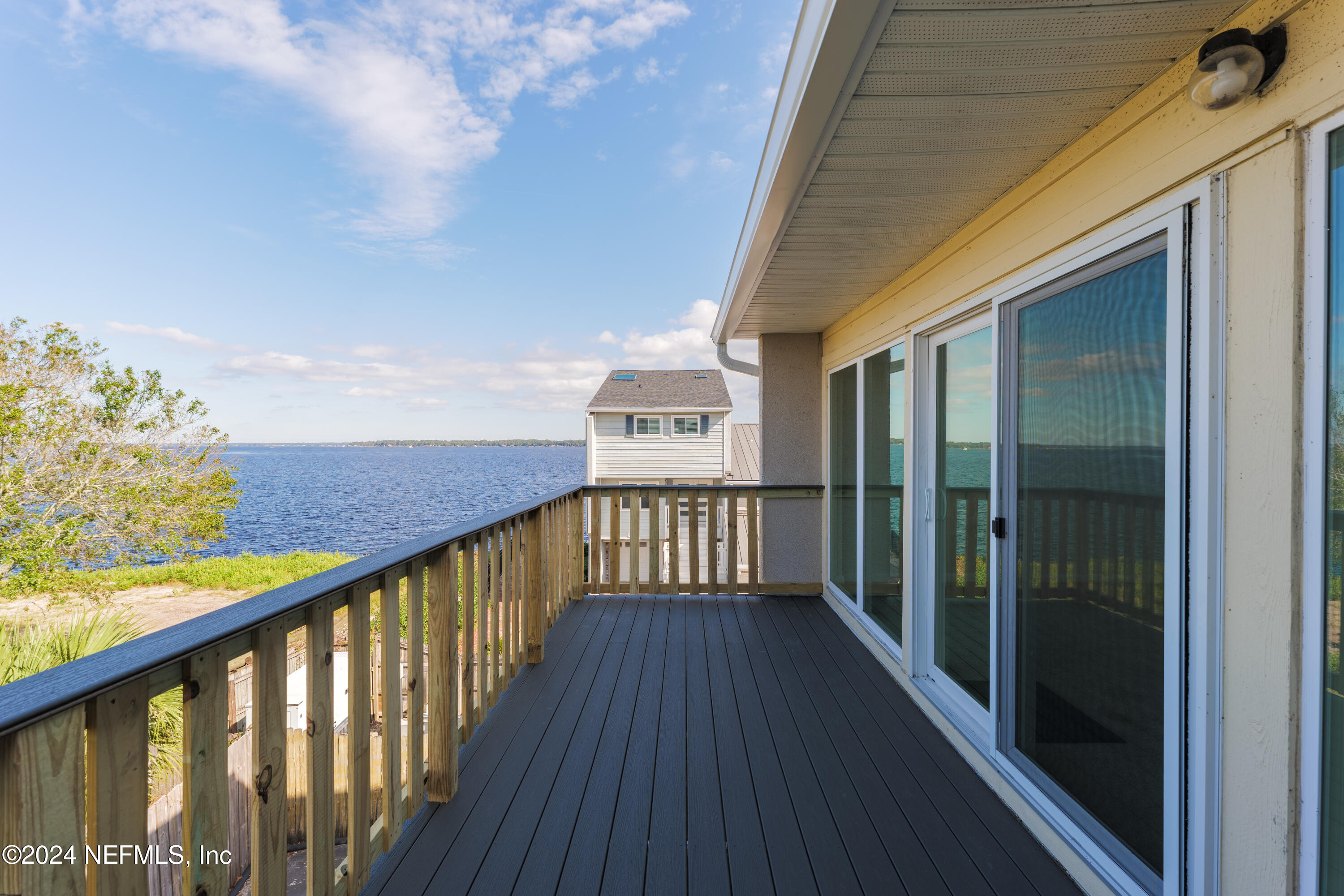327 Scenic Point Lane Fleming Island, FL 32003 - Photo 27 of 54 a view of balcony with wooden floor
