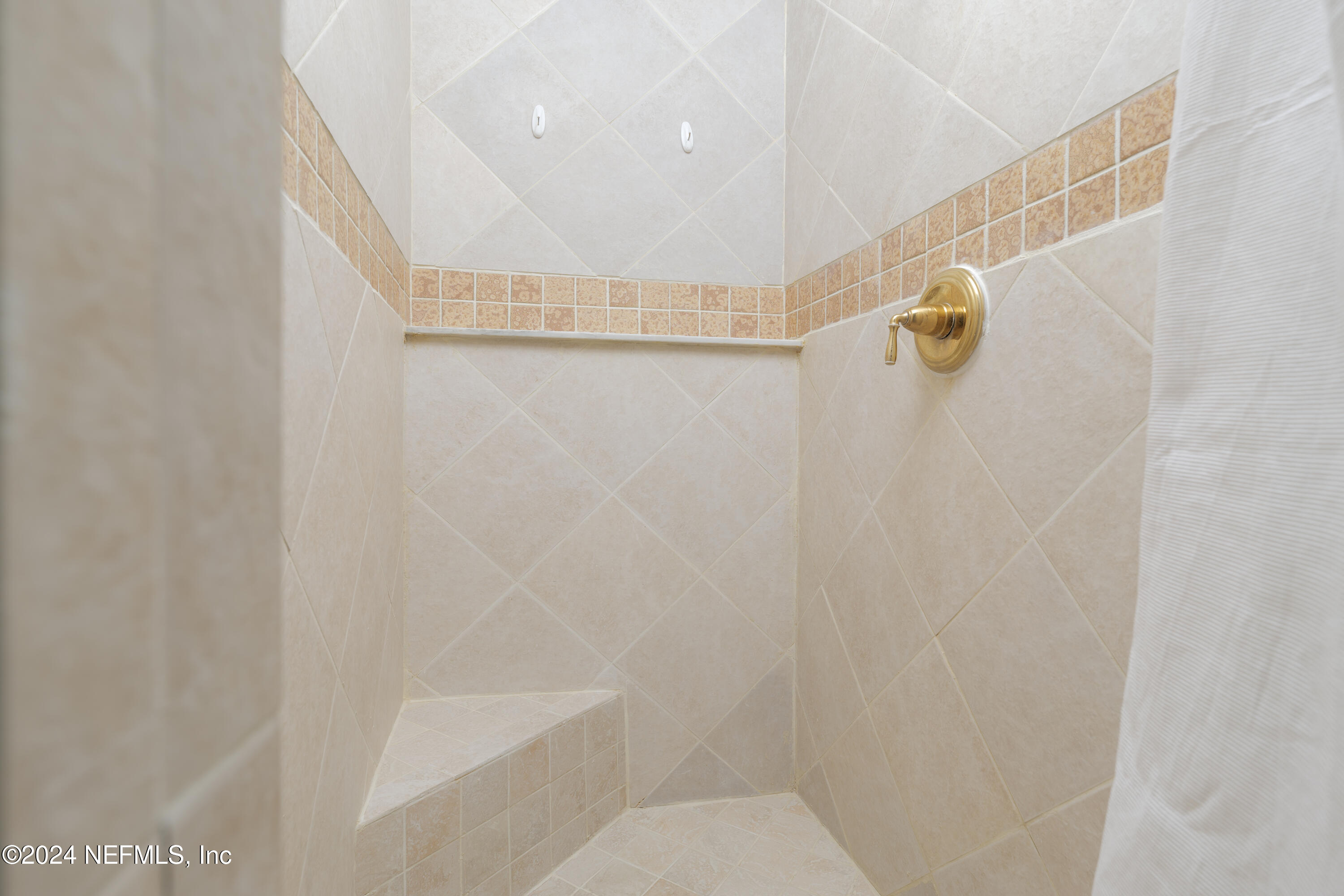 327 Scenic Point Lane Fleming Island, FL 32003 - Photo 32 of 54 a bathroom with a shower and a shower head