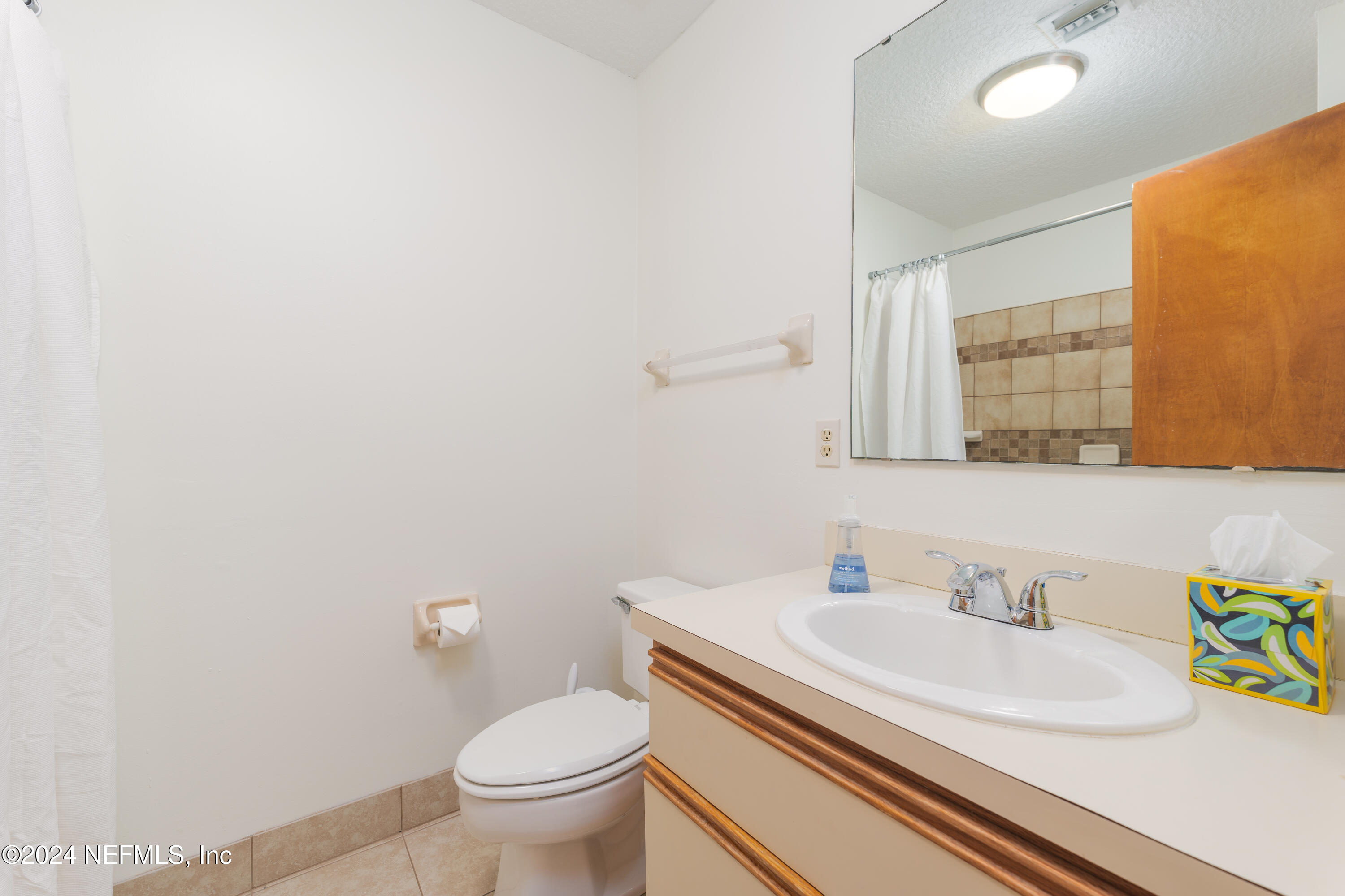 327 Scenic Point Lane Fleming Island, FL 32003 - Photo 36 of 54 a bathroom with a sink and a toilet