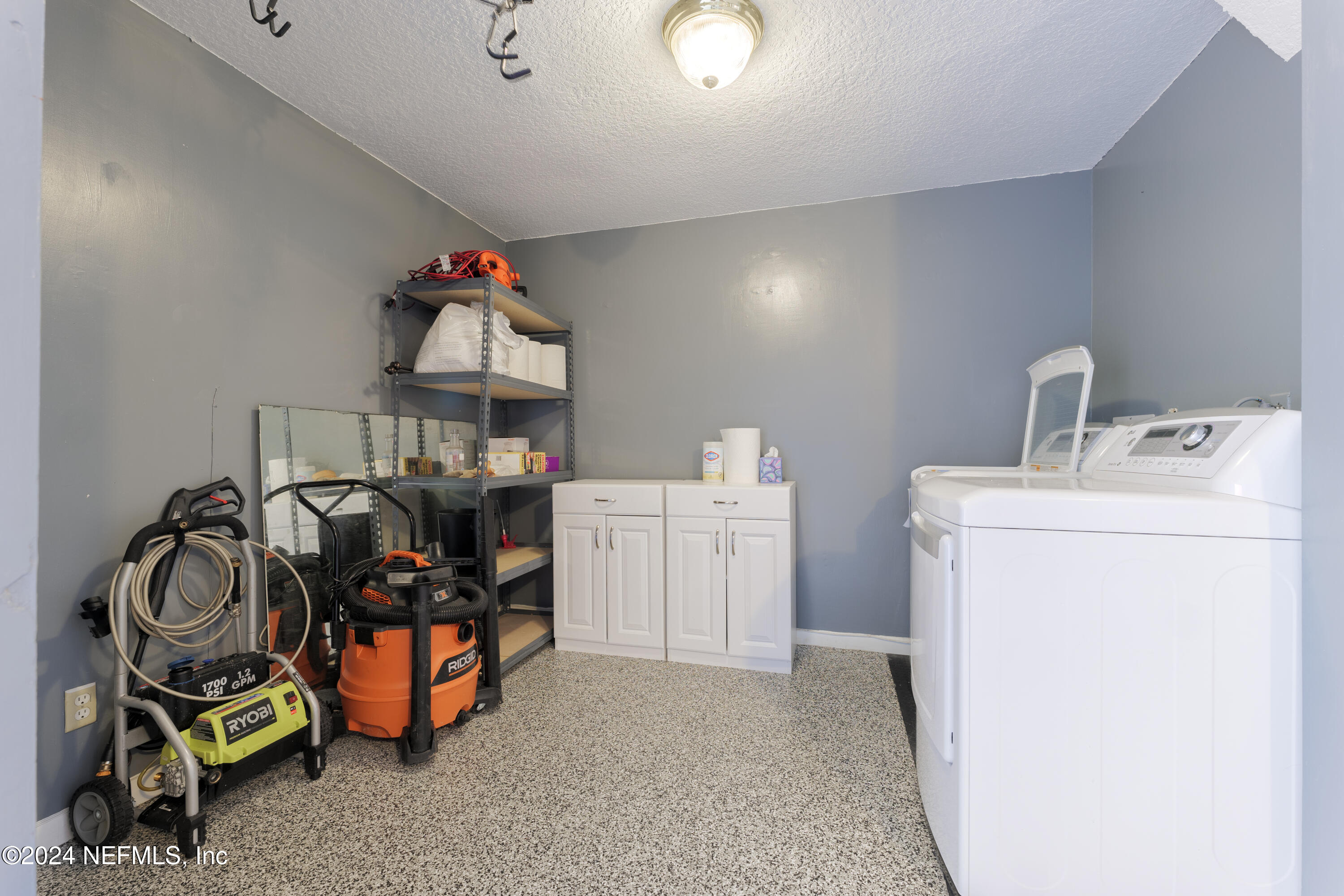 327 Scenic Point Lane Fleming Island, FL 32003 - Photo 46 of 54 a utility room with dryer and washer