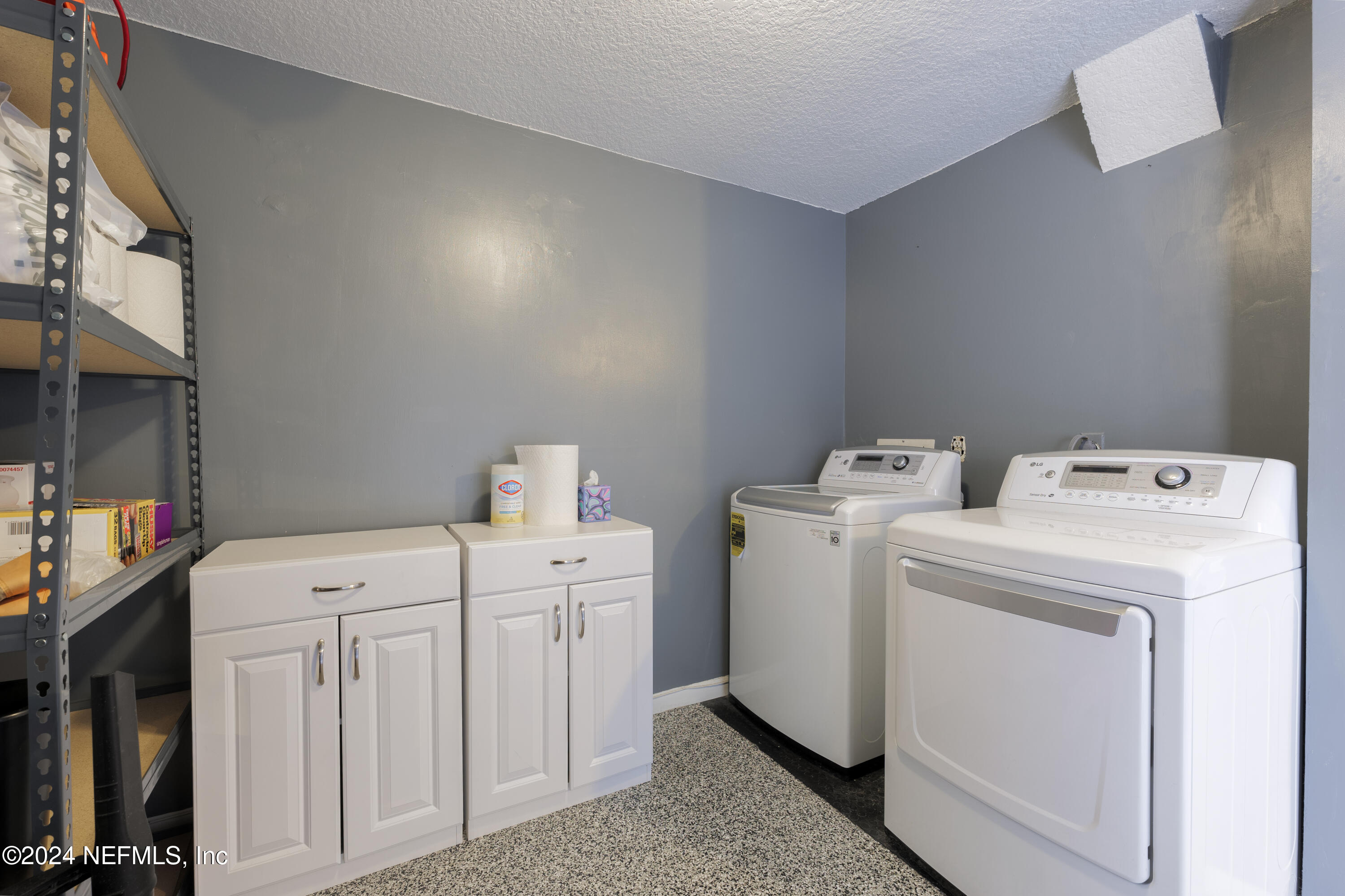 327 Scenic Point Lane Fleming Island, FL 32003 - Photo 47 of 54 a utility room with dryer and washer
