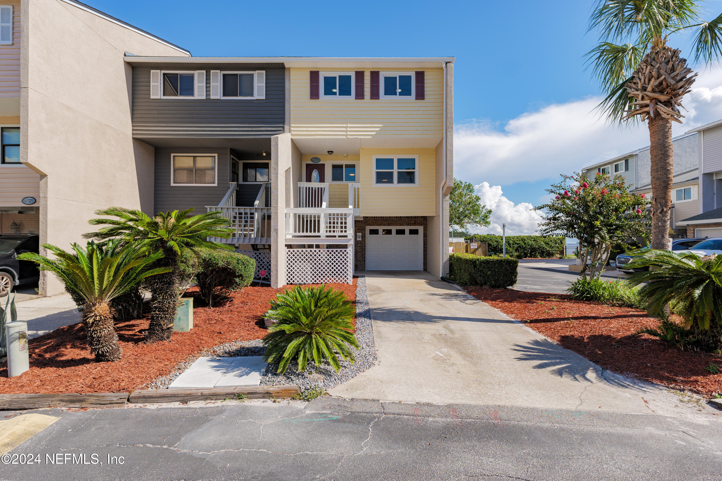 327 Scenic Point Lane Fleming Island, FL 32003 - Photo 7 of 54 a view of a house with a patio