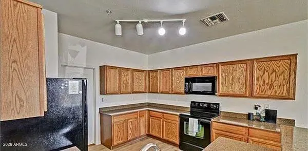 a bathroom with a sink double vanity and shower