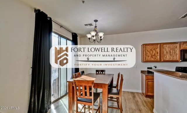 a view of a table and chairs in a room