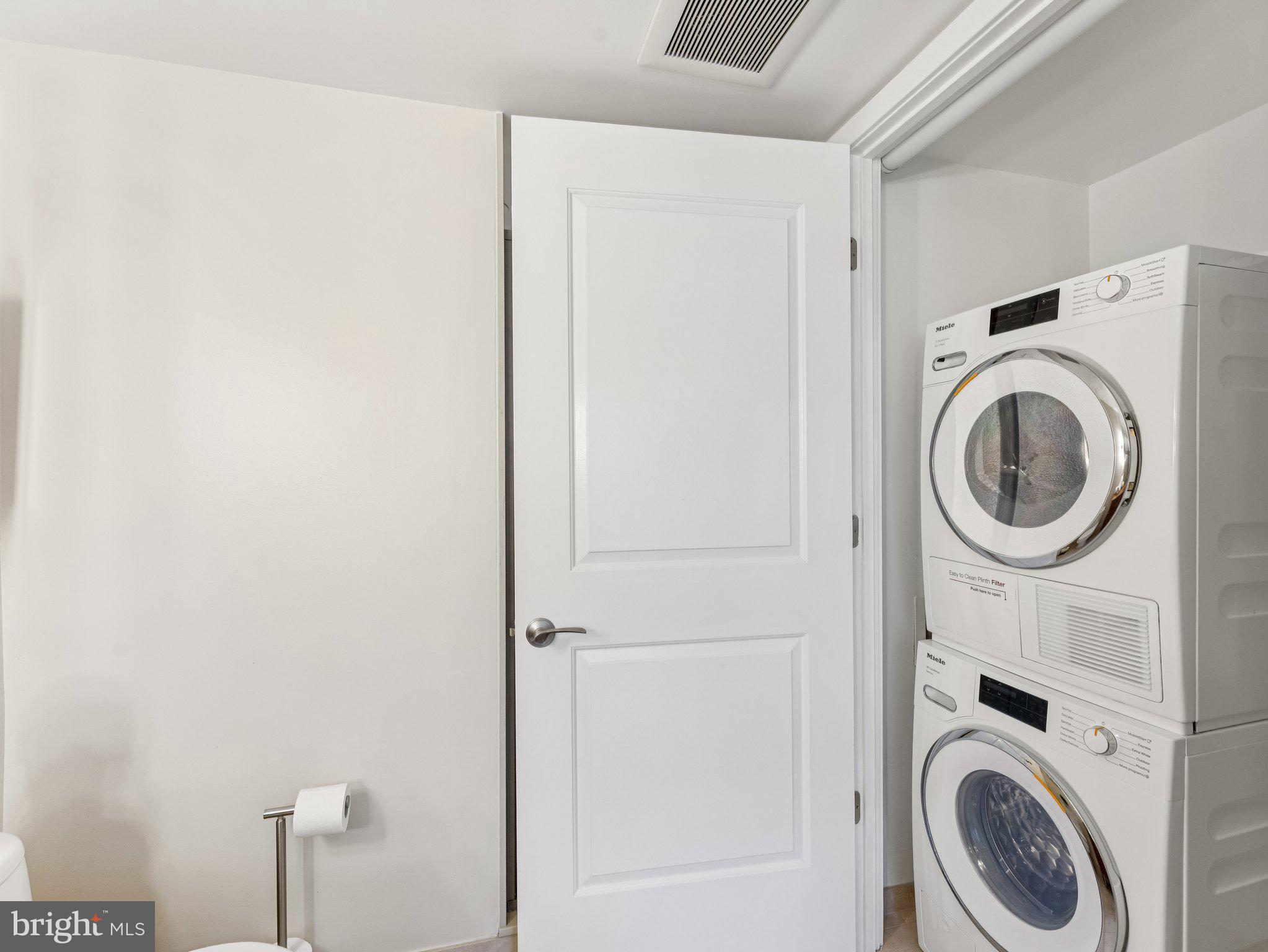 1025 First Street Southeast, Unit 1212 Washington, DC 20003 - Photo 15 of 34 Laundry in primary bath