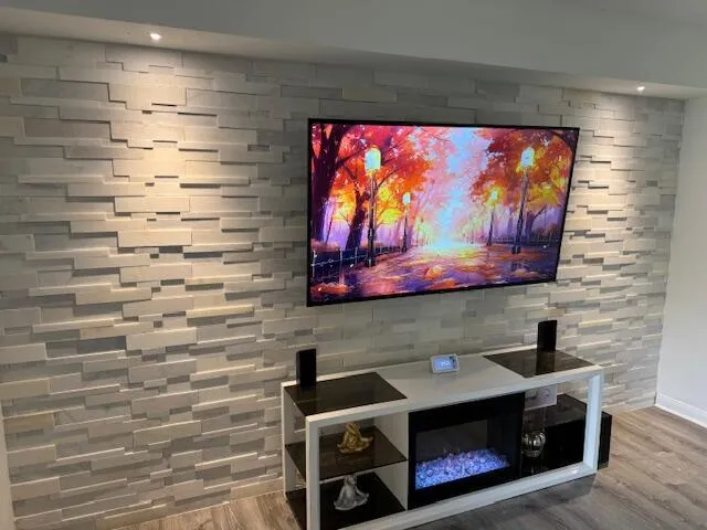 a room with stainless steel appliances and cabinets