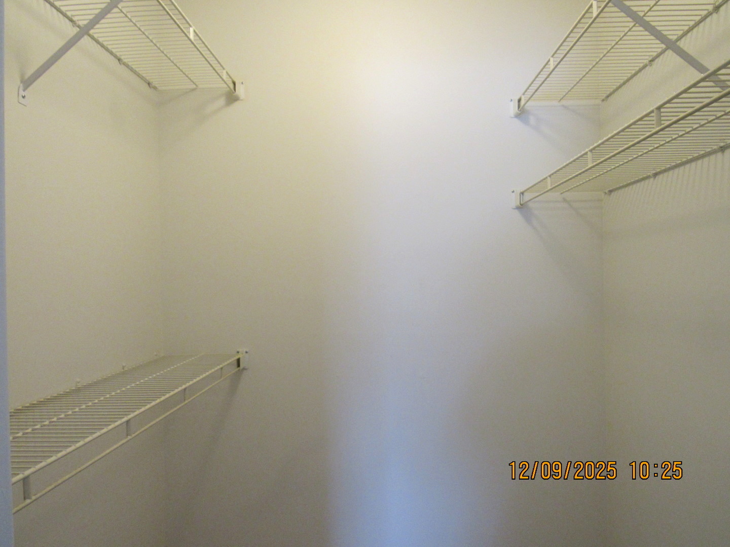 2790 Glasgow Court, Unit X1 Schaumburg, IL 60107 - Photo 13 of 18 a view of a room with racks on the wall
