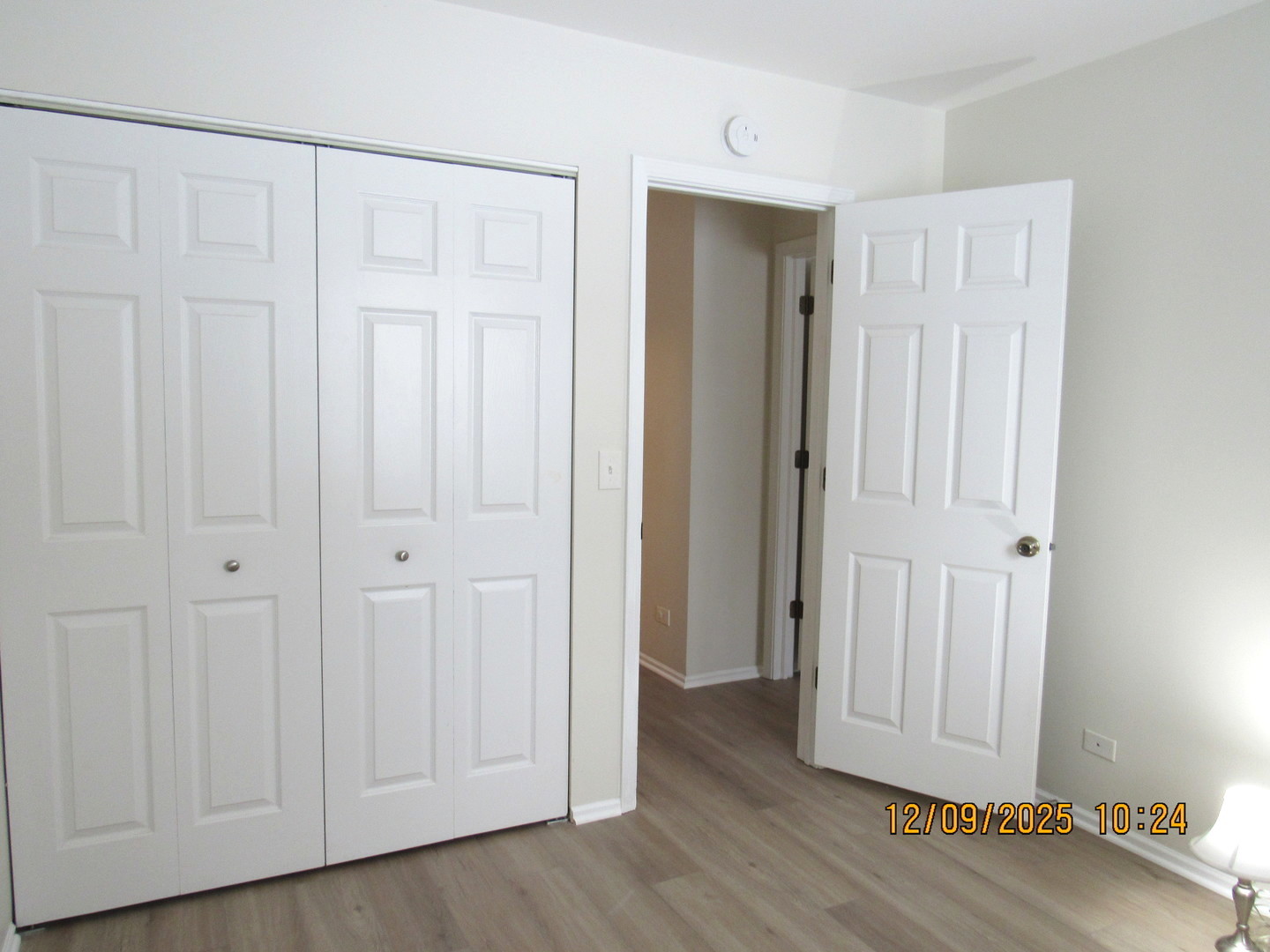 2790 Glasgow Court, Unit X1 Schaumburg, IL 60107 - Photo 14 of 18 an empty room with wooden floor