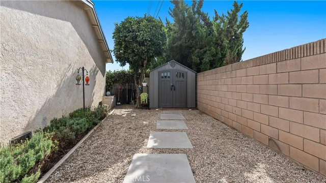 an aerial view of a house with a swimming pool