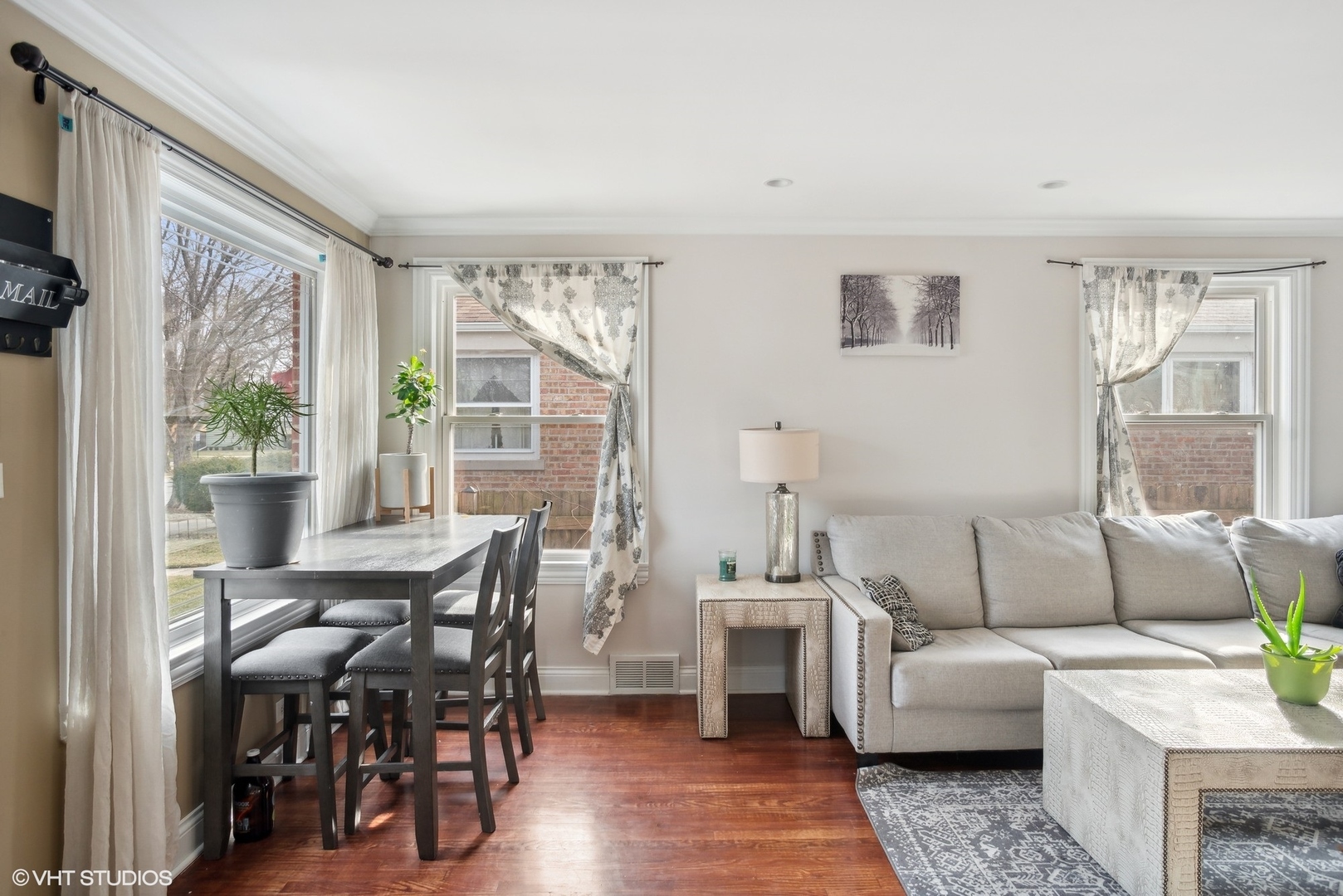 2412 Greenleaf Street Evanston, IL 60202 - Photo 3 of 20 a living room with furniture and a window