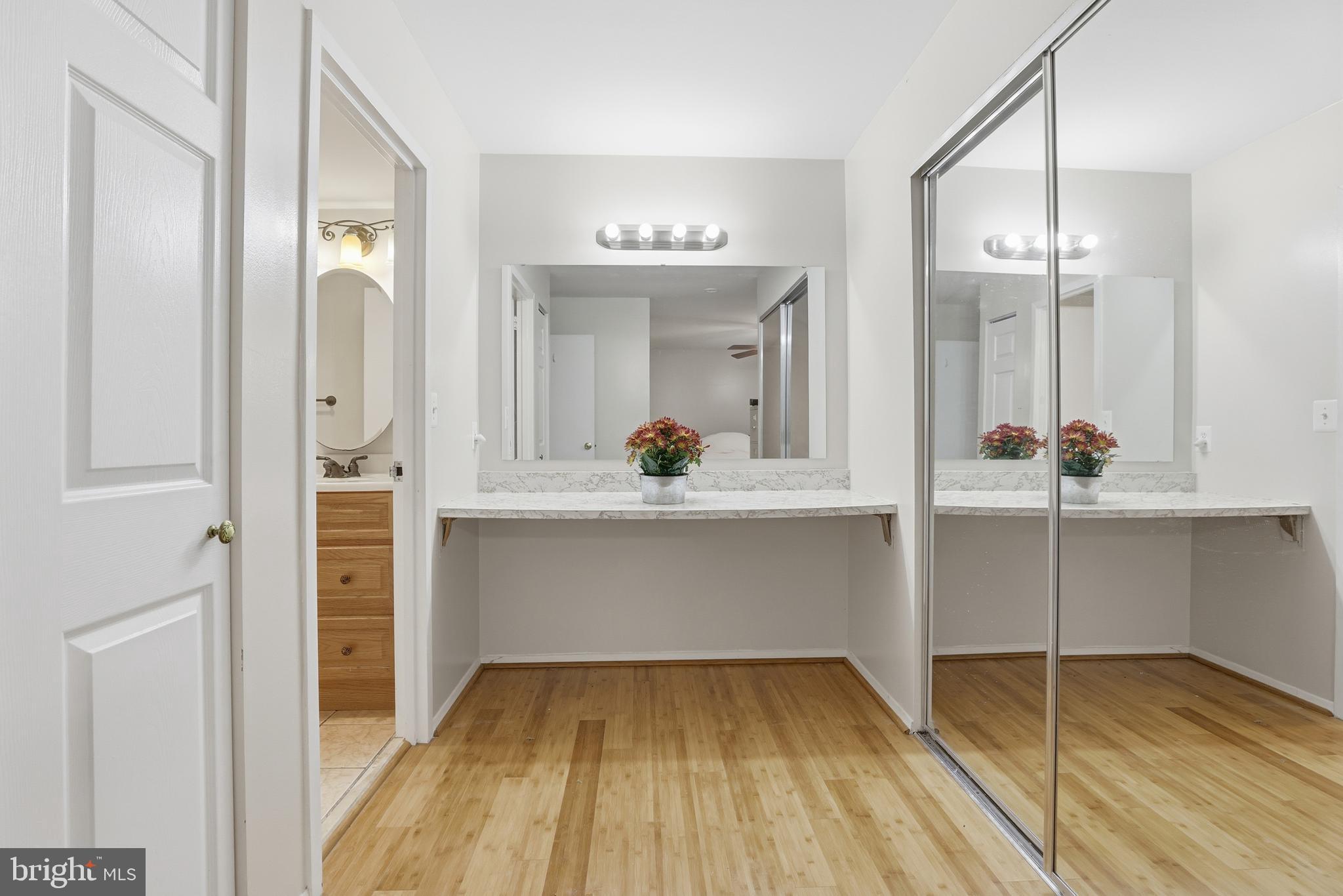 427 Christopher Avenue, Unit T2 Gaithersburg, MD 20879 - Photo 17 of 28 a bathroom with a sink and a mirror