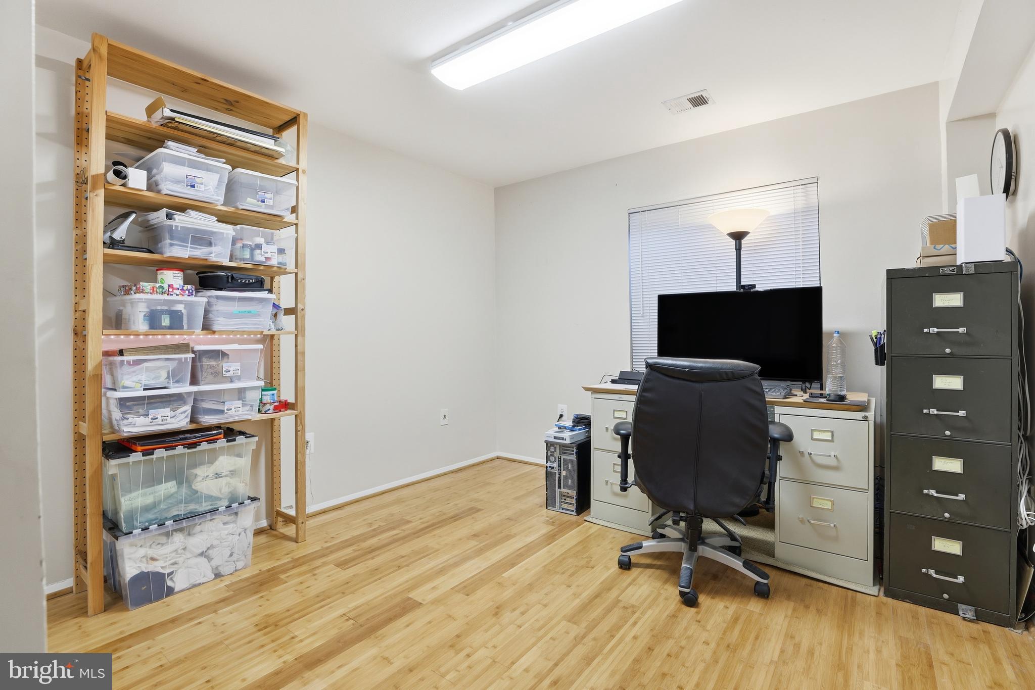 427 Christopher Avenue, Unit T2 Gaithersburg, MD 20879 - Photo 22 of 28 a view of a workspace with furniture