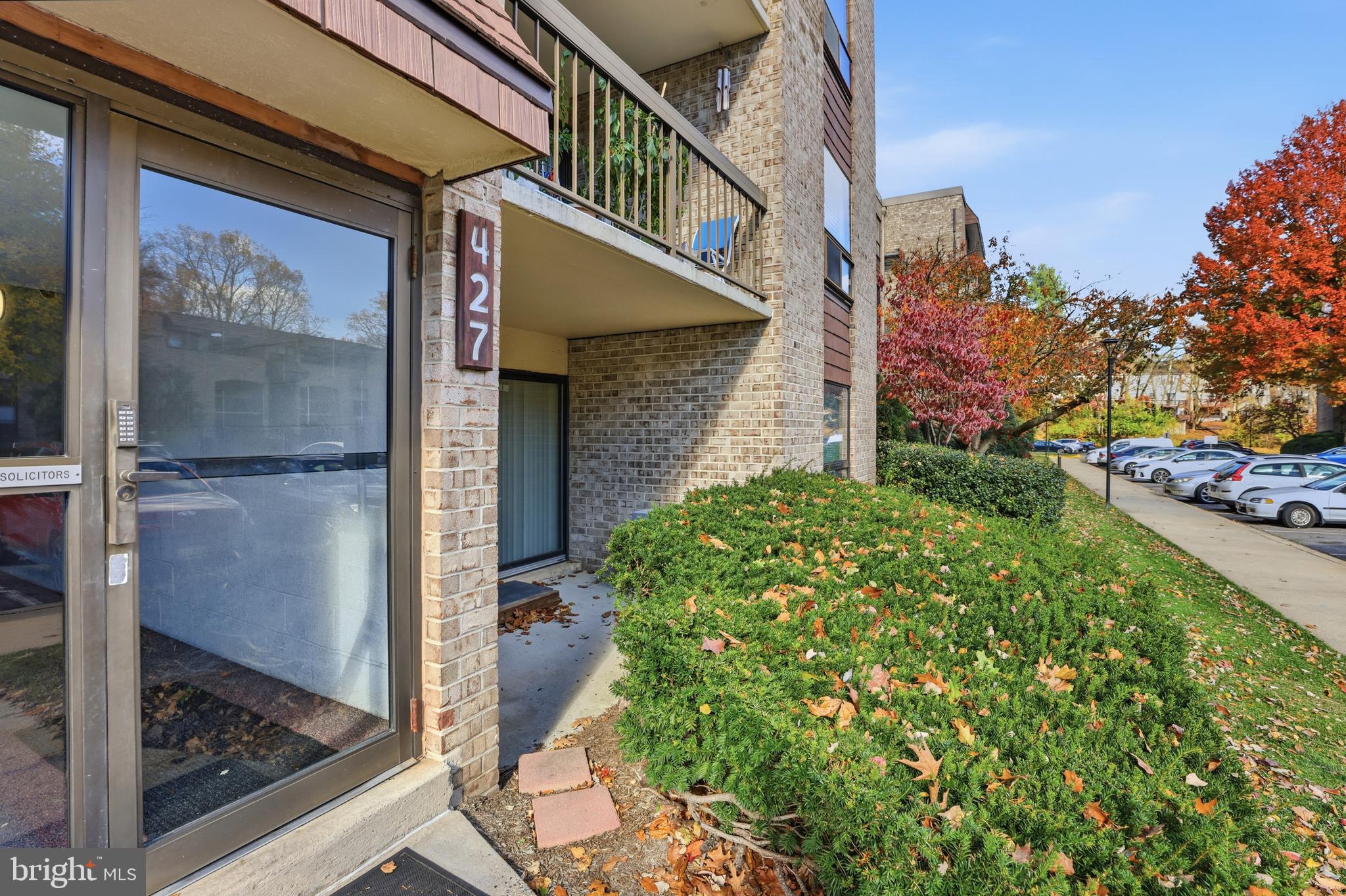 427 Christopher Avenue, Unit T2 Gaithersburg, MD 20879 - Photo 26 of 28 a backyard of a house with lots of green space