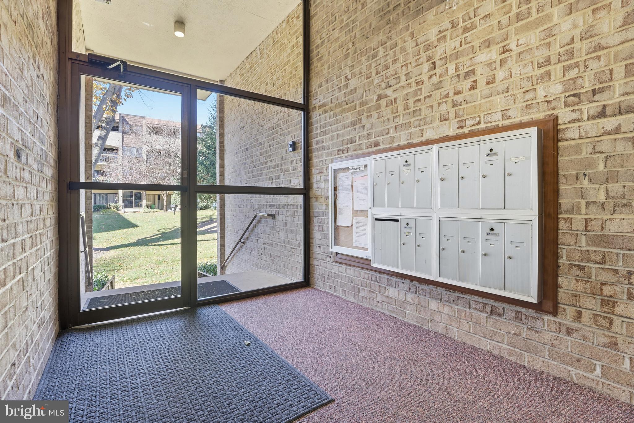 427 Christopher Avenue, Unit T2 Gaithersburg, MD 20879 - Photo 3 of 28 a view of an empty room with a window