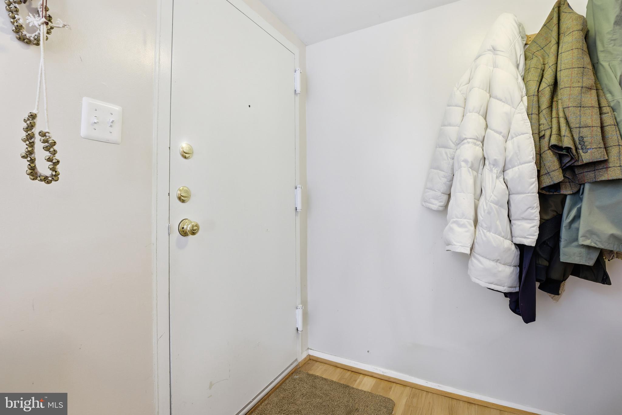 427 Christopher Avenue, Unit T2 Gaithersburg, MD 20879 - Photo 6 of 28 a view of walk in closet with clothes and shoes