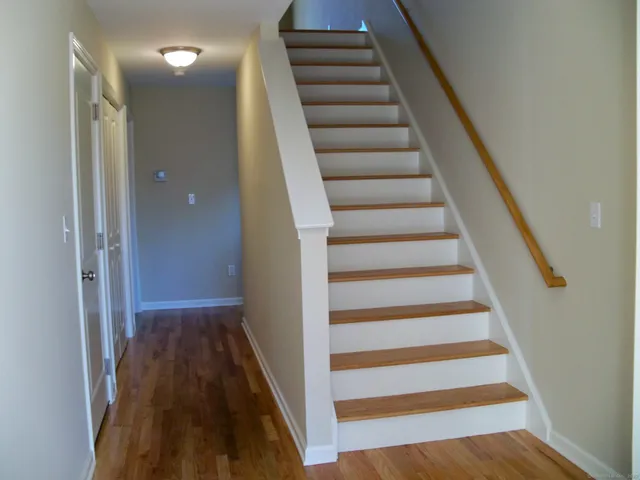 a view of entryway with wooden floor