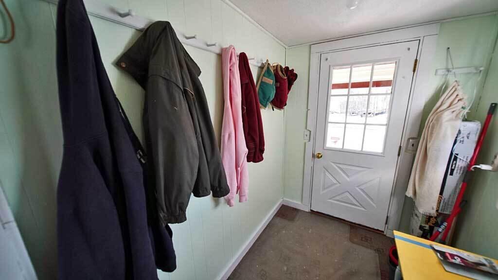 57 Old Patten Road Island Falls, ME 04747 - Photo 20 of 49 coat-room-57-patten-rd