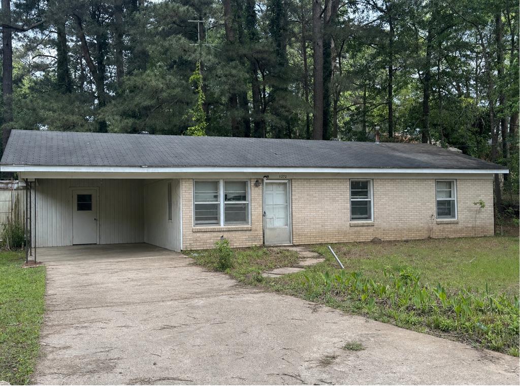 1272 Carson Street Haynesville, LA 71038 - Photo 1 of 1 front view of house with a yard