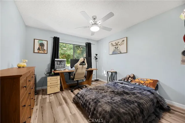 a view of a livingroom with furniture and staircase