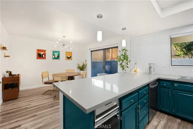 a view of a center island and kitchen counter space