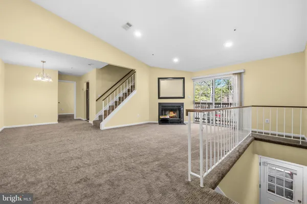 a view of a livingroom with a staircase