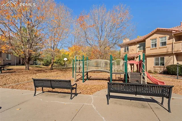 a view of a park with bench and bench
