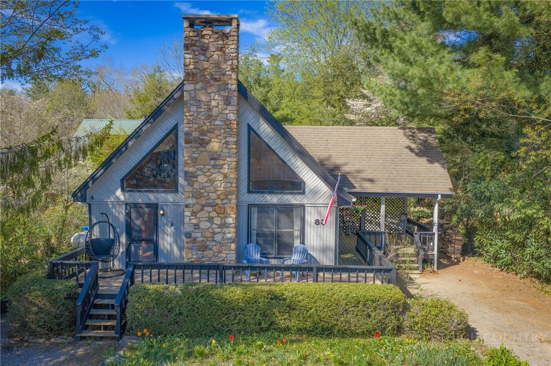 83 Pine Ridge Loop Newland, NC 28657 - Photo 25 of 32 front view of house with a yard