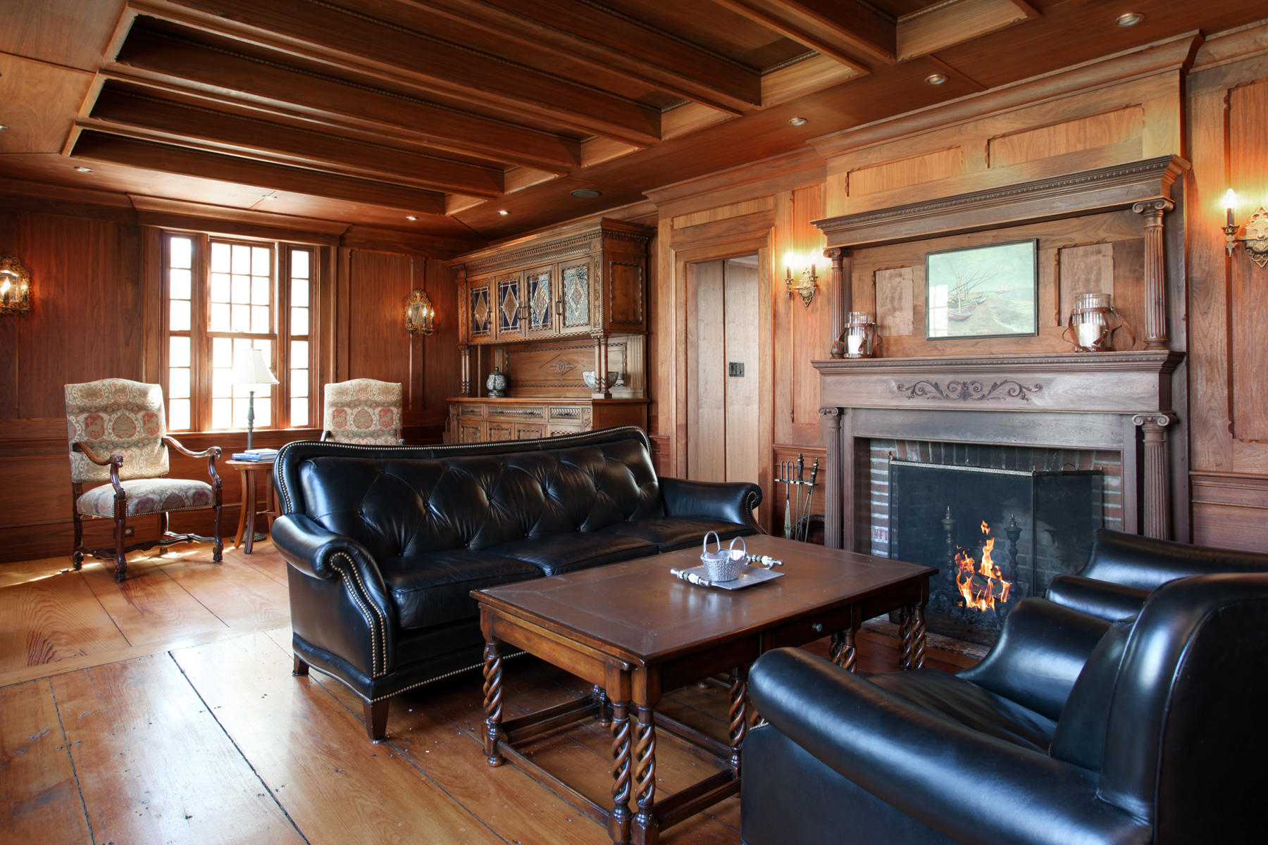 9 East Bay Road Osterville, MA 02655 - Photo 12 of 30 a living room with furniture and a fireplace